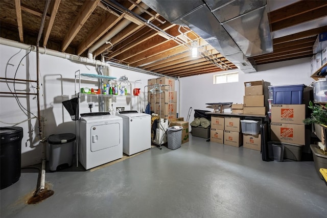 basement with washer and clothes dryer
