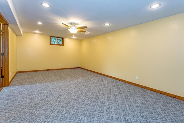basement with recessed lighting, baseboards, and carpet