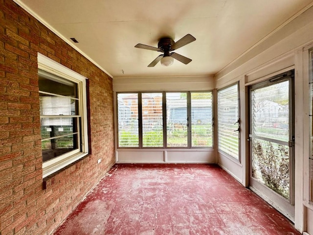 2105 Muscatine Ave, Iowa City, IA 52240 - unfurnished sunroom with ornamental molding and brick wall