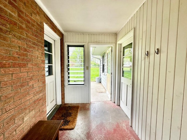 2105 Muscatine Ave, Iowa City, IA 52240 - interior space with plenty of natural light and brick wall