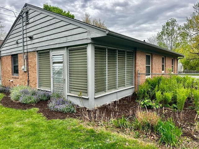 2105 Muscatine Ave, Iowa City, IA 52240 - view of side of home with brick siding