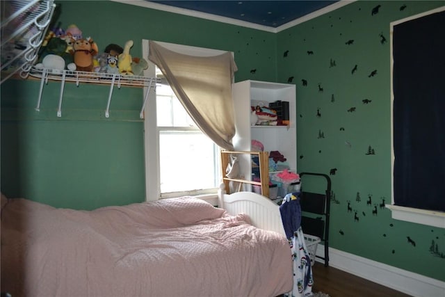 855 Center Pt NE, Cedar Rapids, IA 52402 - bedroom featuring wood finished floors and crown molding