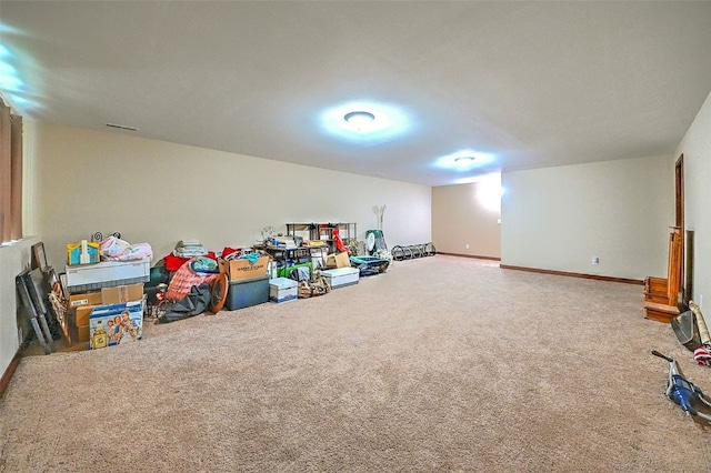 game room featuring baseboards and carpet