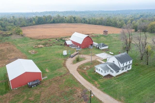 birds eye view of property featuring a rural view