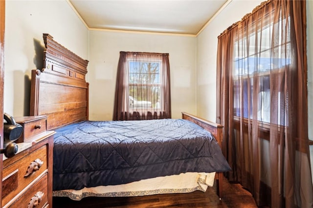 bedroom with crown molding