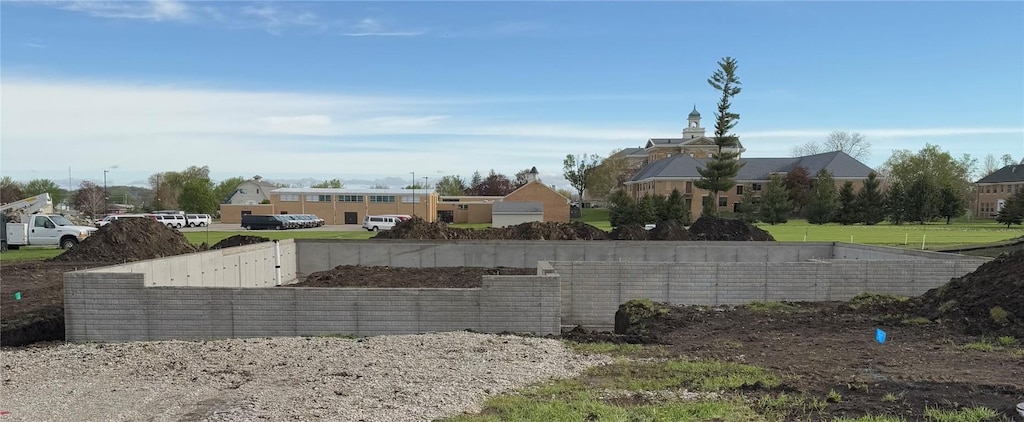 exterior space with fence and a residential view