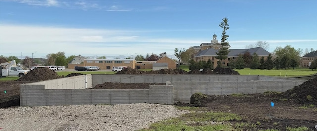 exterior space with fence and a residential view