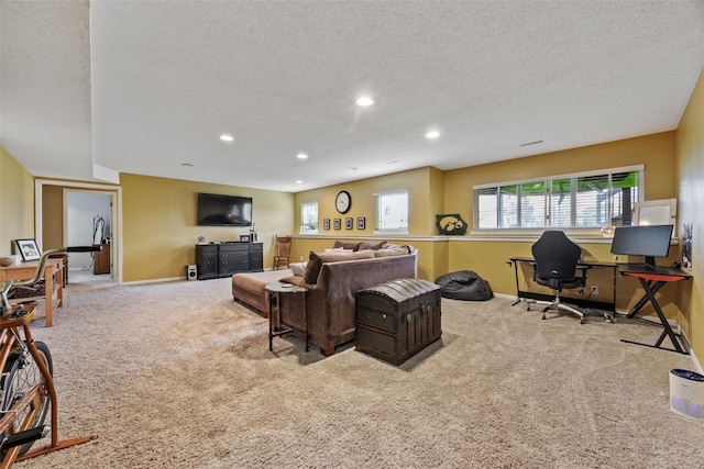 living area featuring carpet floors, recessed lighting, and a healthy amount of sunlight