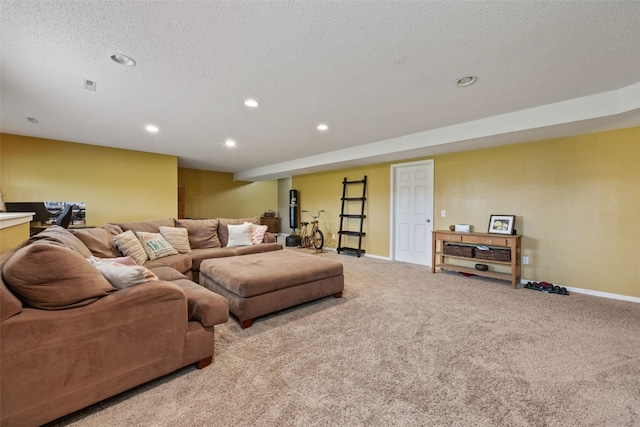 living room featuring recessed lighting, baseboards, carpet, and a textured ceiling
