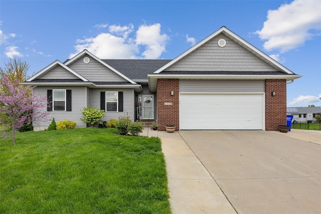 ranch-style home featuring brick siding, a garage, a front lawn, and driveway