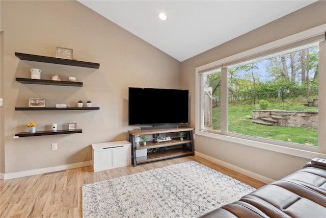 living room featuring baseboards, recessed lighting, wood finished floors, and lofted ceiling