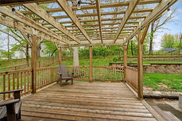 wooden deck featuring a fenced backyard, a pergola, and a yard