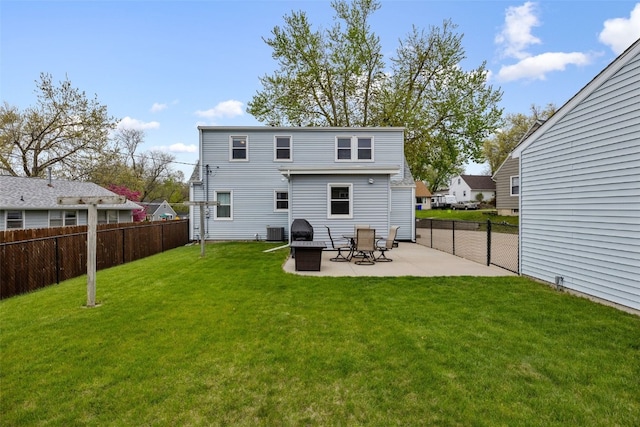 back of property featuring central air condition unit, fence, a patio, and a yard