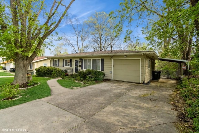single story home with an attached garage, driveway, and a front yard
