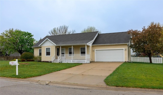 ranch-style home with a porch, driveway, a garage, fence, and a front lawn