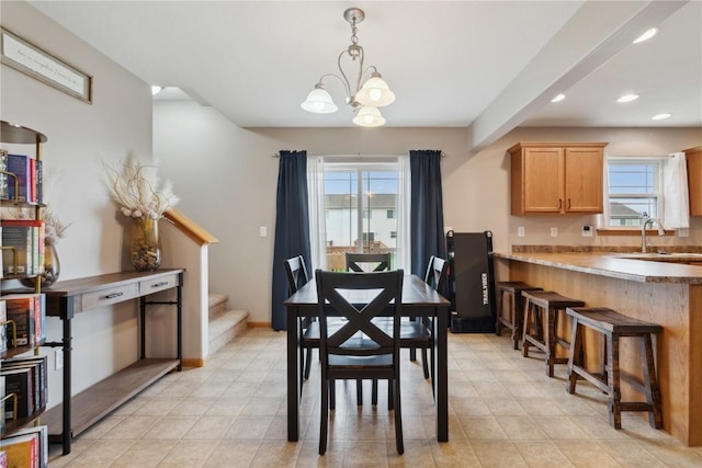 dining room featuring an inviting chandelier, stairs, baseboards, recessed lighting, and light tile patterned floors