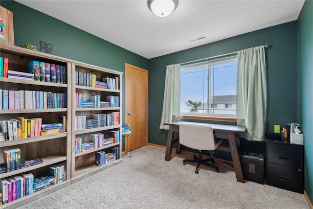 office area with baseboards and carpet flooring