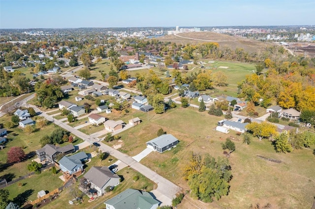 birds eye view of property with a residential view