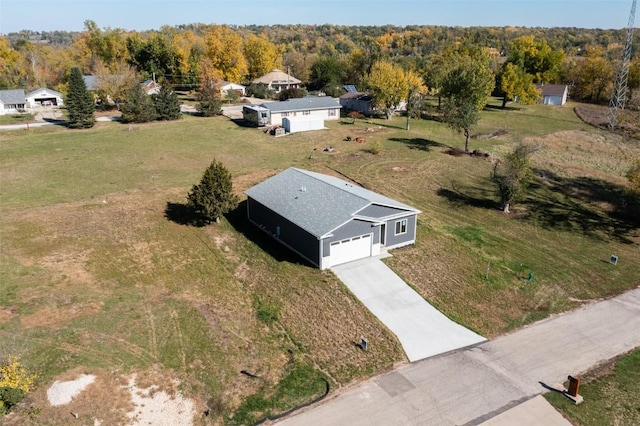 bird's eye view featuring a view of trees