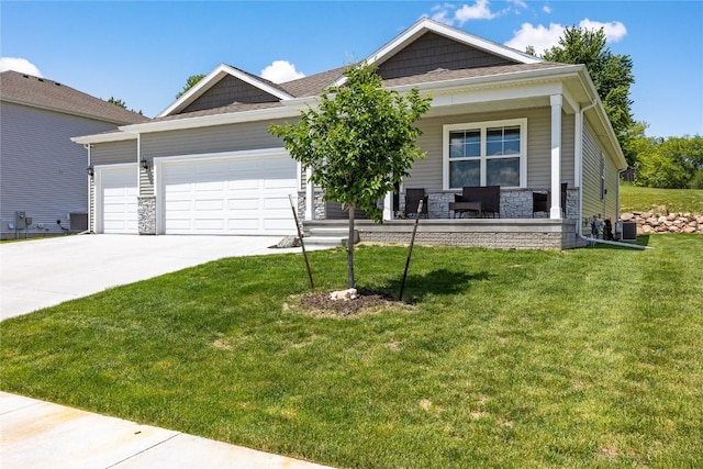 view of front facade featuring covered porch, concrete driveway, an attached garage, and a front yard