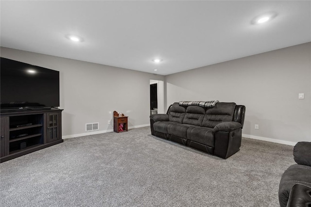 living room featuring carpet, baseboards, visible vents, and recessed lighting