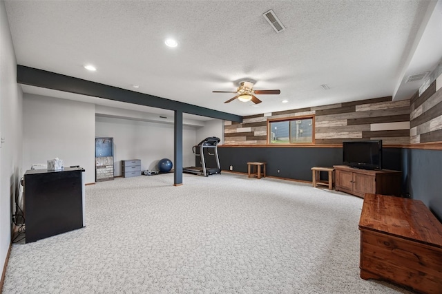 living room with a ceiling fan, recessed lighting, carpet flooring, and visible vents
