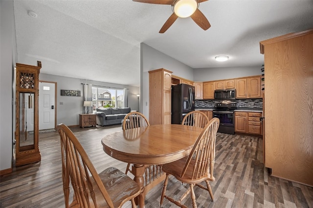 dining room featuring ceiling fan and dark wood-style floors