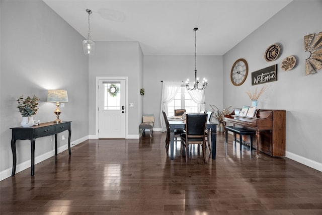 4332 Quail Trail Dr, Marion, IA 52302 - dining area featuring a chandelier, wood finished floors, baseboards, and a high ceiling