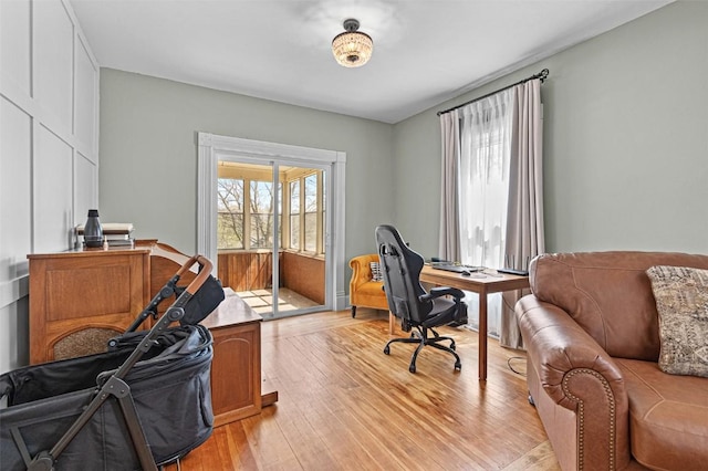 office with light wood-type flooring