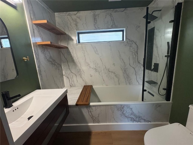 22101 Pleasant Dr, Bernard, IA 52032 - bathroom featuring a marble finish shower, a tub with marble appearance, toilet, and vanity