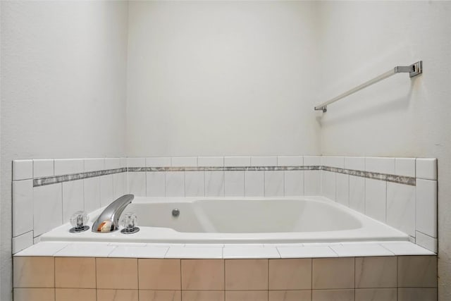 bathroom with a garden tub