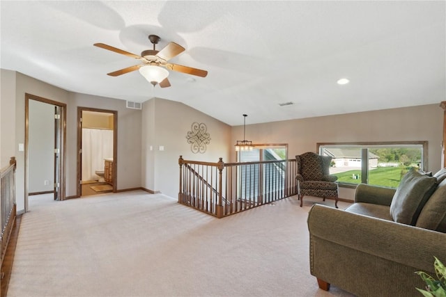 4199 Brookside Dr, Marion, IA 52302 - living area with an upstairs landing, ceiling fan, light carpet, and visible vents