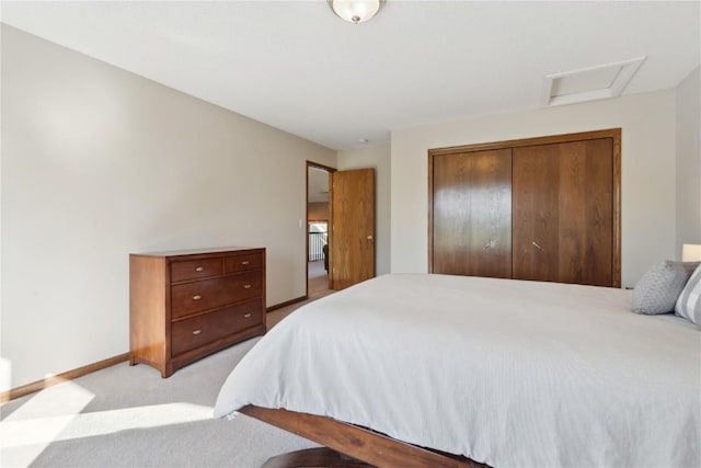 4199 Brookside Dr, Marion, IA 52302 - bedroom featuring baseboards, light carpet, a closet, and attic access