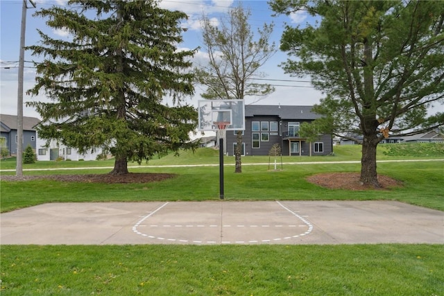 4199 Brookside Dr, Marion, IA 52302 - view of basketball court featuring a lawn and community basketball court