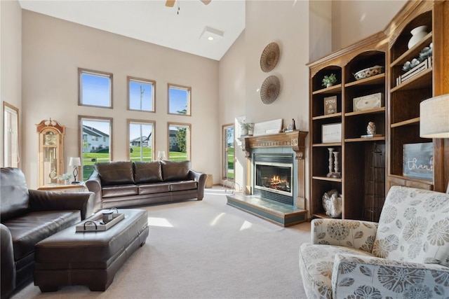 4199 Brookside Dr, Marion, IA 52302 - living room with a ceiling fan, carpet, high vaulted ceiling, and a glass covered fireplace