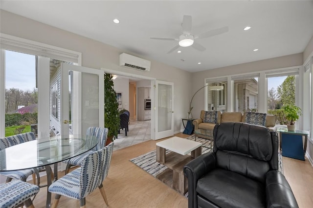 living area with recessed lighting, french doors, ceiling fan, and a wall mounted AC