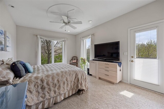bedroom with a ceiling fan, light carpet, access to outside, and recessed lighting