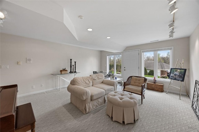 living area with light colored carpet, vaulted ceiling, baseboards, and recessed lighting