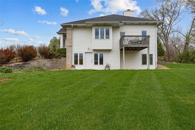 back of property featuring a yard, a deck, and a chimney