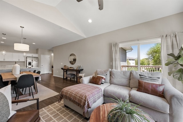 living area featuring high vaulted ceiling, ceiling fan, dark wood-type flooring, and recessed lighting