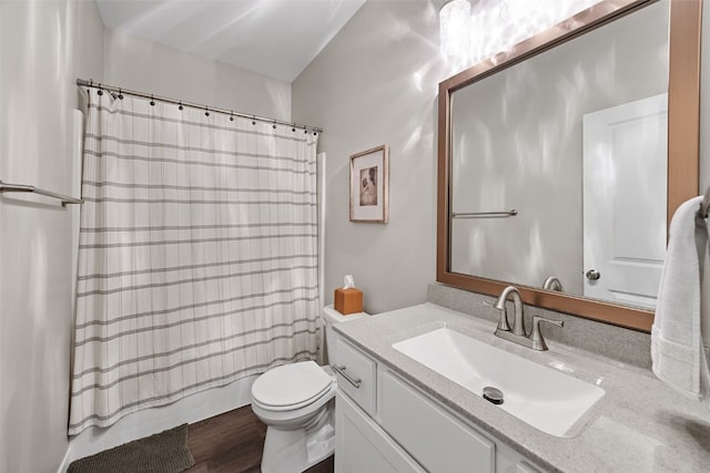 full bath with vanity, toilet, and shower / bath combo