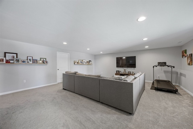 living room with carpet, baseboards, and recessed lighting