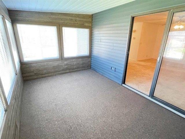 unfurnished sunroom featuring plenty of natural light