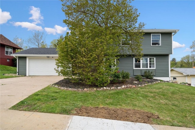 335 Parkland Dr SE, Cedar Rapids, IA 52403 - view of front of house with driveway, a front lawn, and a garage