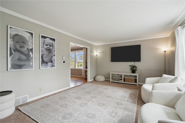 335 Parkland Dr SE, Cedar Rapids, IA 52403 - carpeted living room with crown molding, visible vents, and baseboards