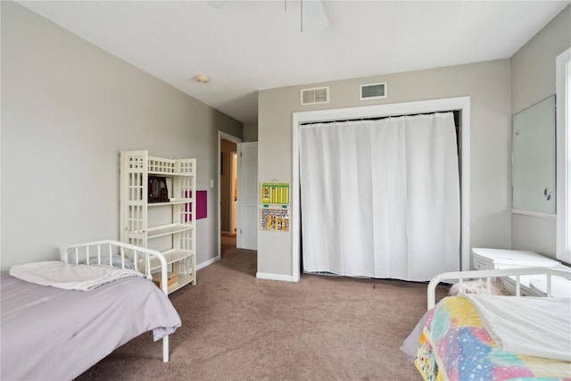 335 Parkland Dr SE, Cedar Rapids, IA 52403 - bedroom featuring carpet, visible vents, baseboards, and a closet