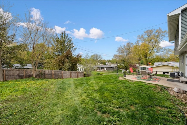 335 Parkland Dr SE, Cedar Rapids, IA 52403 - view of yard featuring central air condition unit, fence, and a patio