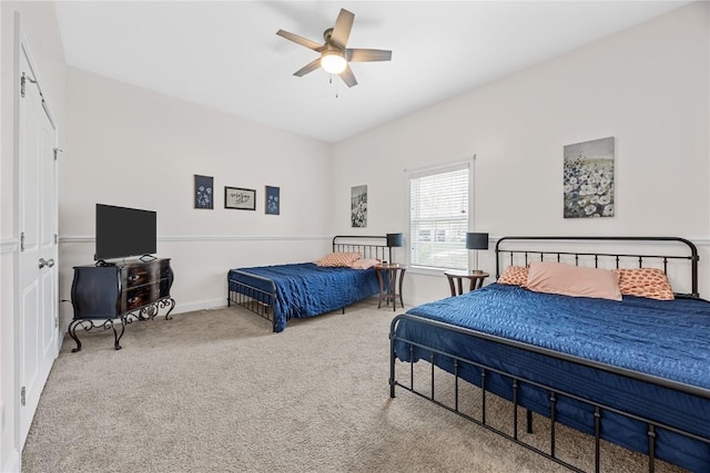 3618 Kegler Ct SE, Cedar Rapids, IA 52403 - carpeted bedroom with baseboards and a ceiling fan