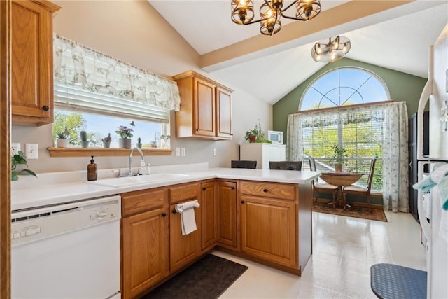 3110 Willowridge Rd Unit D, Marion, IA 52302 - kitchen with dishwasher, lofted ceiling, a chandelier, a sink, and light countertops