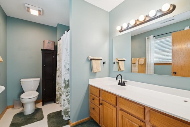 3110 Willowridge Rd Unit D, Marion, IA 52302 - full bath with toilet, vanity, and baseboards